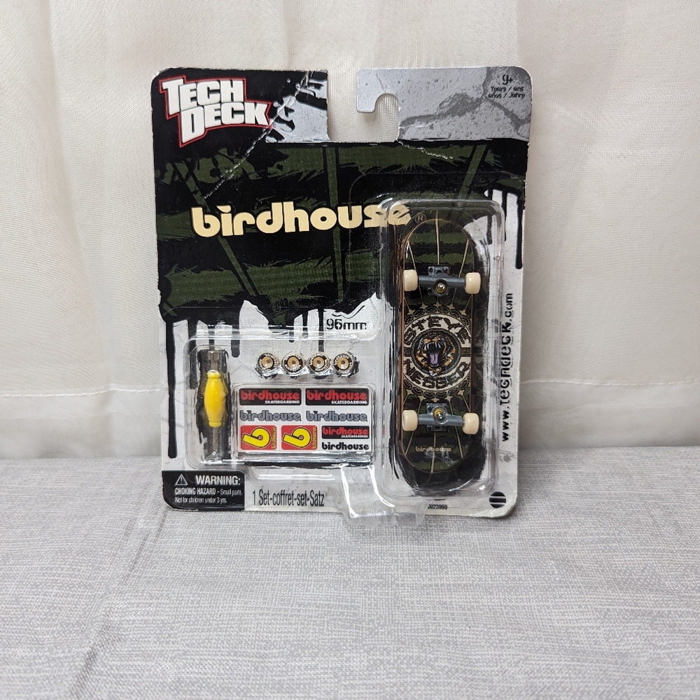 Tech Deck Birdhouse Skateboard 96 MM Tiger Face Black LogoThis Tech Deck Bird